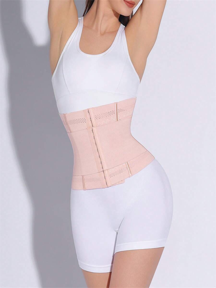 Black adjustable waist cincher shapewear for women made of high stretch knitted fabric for tummy and waist control.