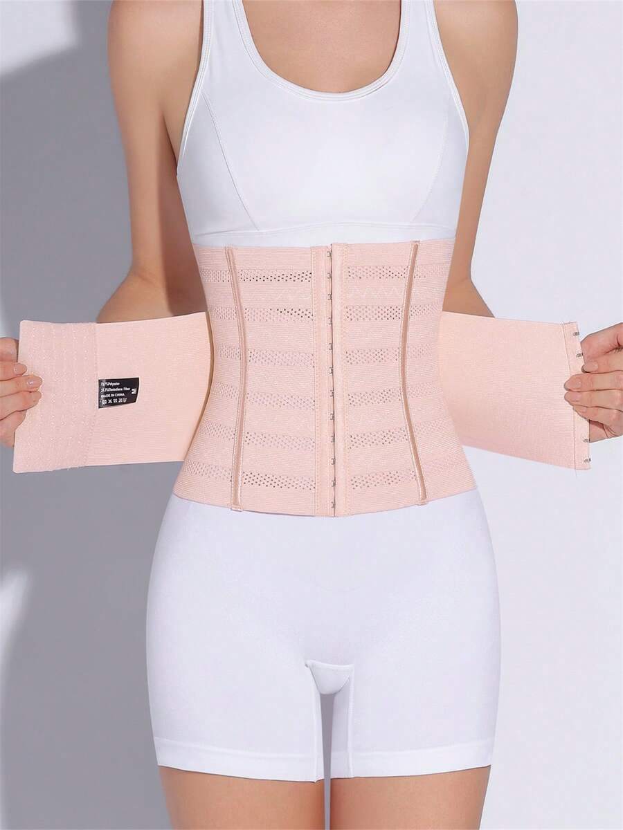 Black adjustable waist cincher shapewear for women made of high stretch knitted fabric for tummy and waist control.