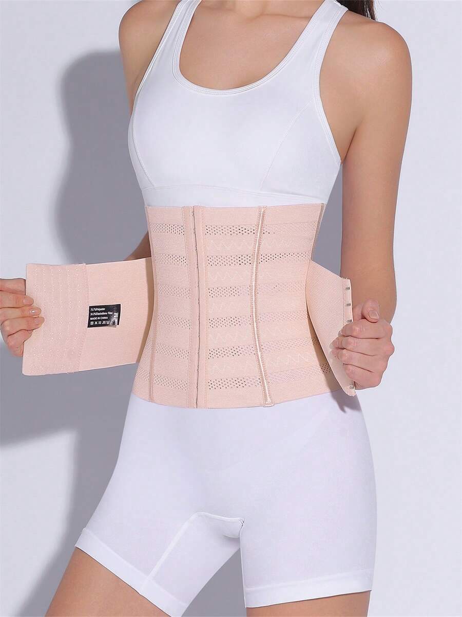 Black adjustable waist cincher shapewear for women made of high stretch knitted fabric for tummy and waist control.