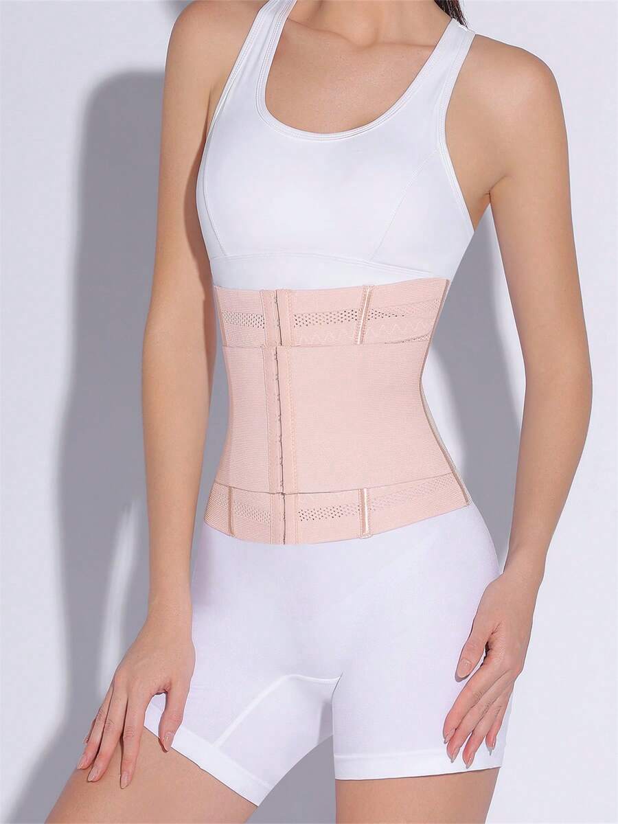 Black adjustable waist cincher shapewear for women made of high stretch knitted fabric for tummy and waist control.