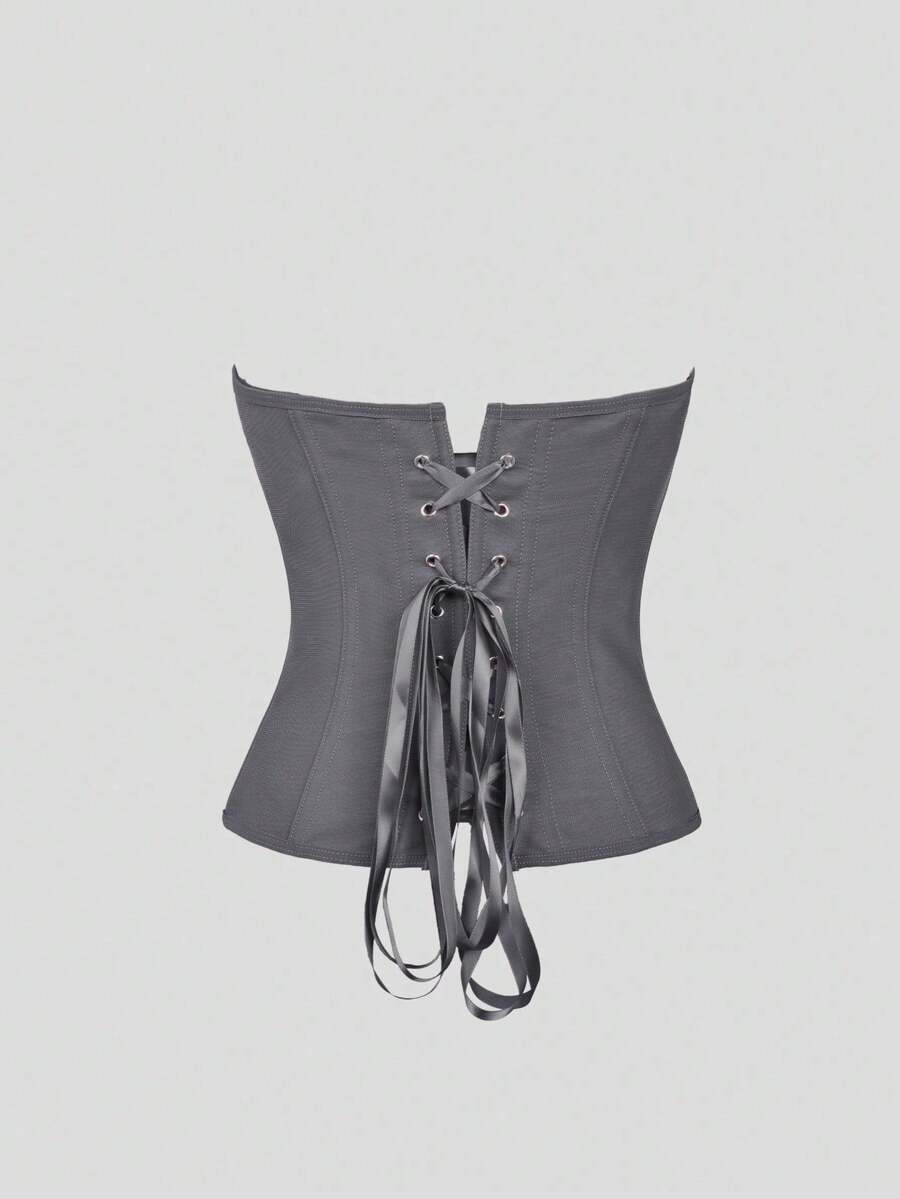 Red strapless corset top with boning and lace-up back, slim fit cropped tube top for women.