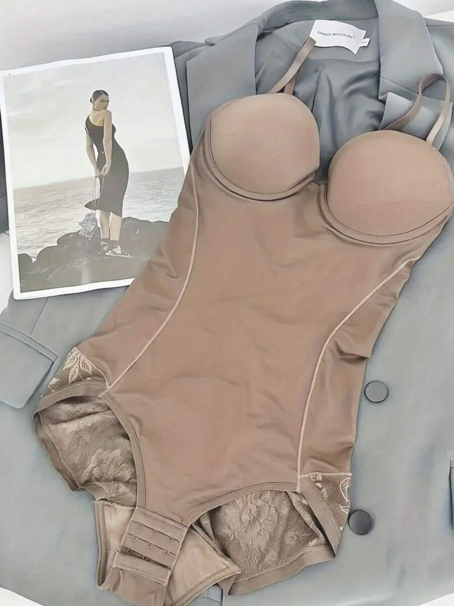 Women's lace shapewear bodysuit with tummy control, built-in bra cup pads, waist shaping, and three-row snap crotch in a bodycon fit.