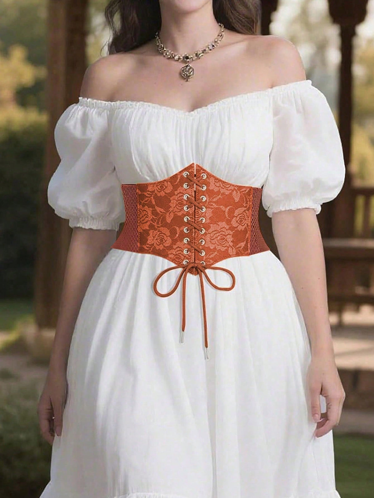 Black lace-up waist cincher with grommet eyelets, baroque pattern, medium stretch, and wide belt design for women.