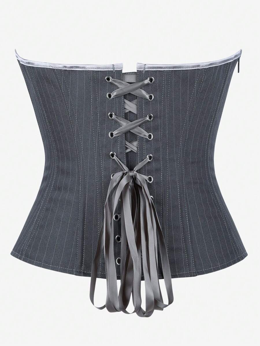 Black overbust corset top with strapless design, boned support, tie-back and zipper closure for women shapewear styling.