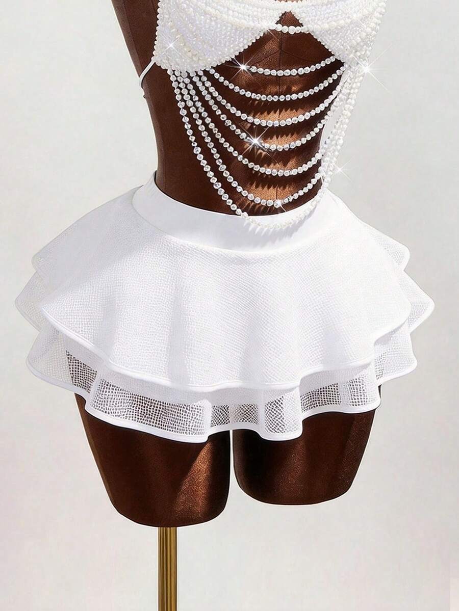 Women's black Y2K rhinestone layered mini skirt with hollow-out detailing and natural mid-waist design