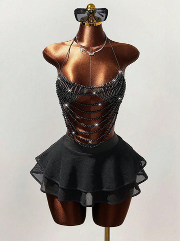 Women's black Y2K rhinestone layered mini skirt with hollow-out detailing and natural mid-waist design