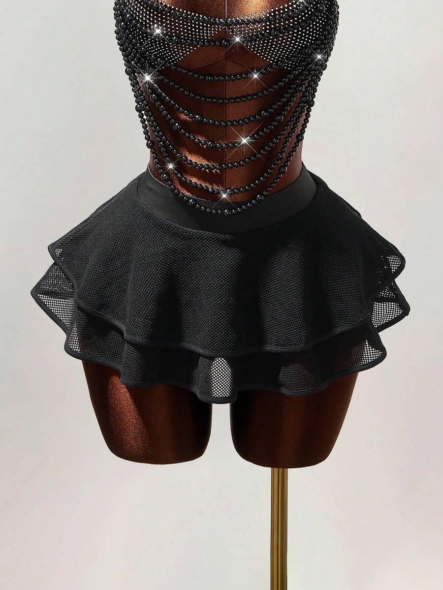 Women's black Y2K rhinestone layered mini skirt with hollow-out detailing and natural mid-waist design