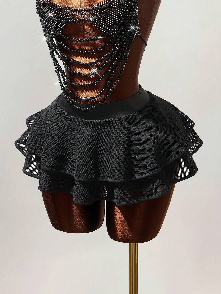 Women's black Y2K rhinestone layered mini skirt with hollow-out detailing and natural mid-waist design