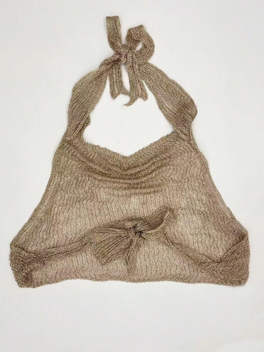 Women's cowl neck metallic knit tank top with thin spaghetti straps and a backless draped silhouette.