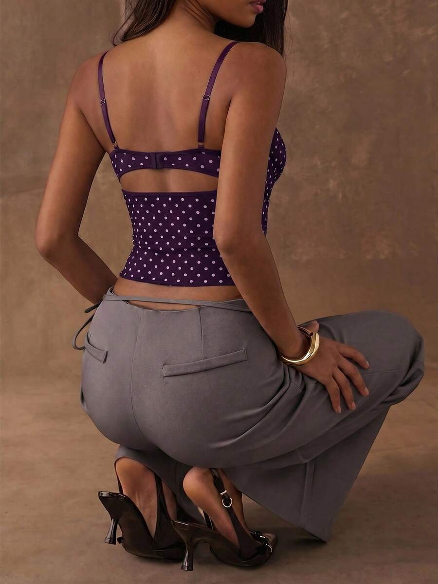 Women's black contrast lace camisole with spaghetti straps, cup detail, semi-sheer finish, and slim fit for going out or date night.
