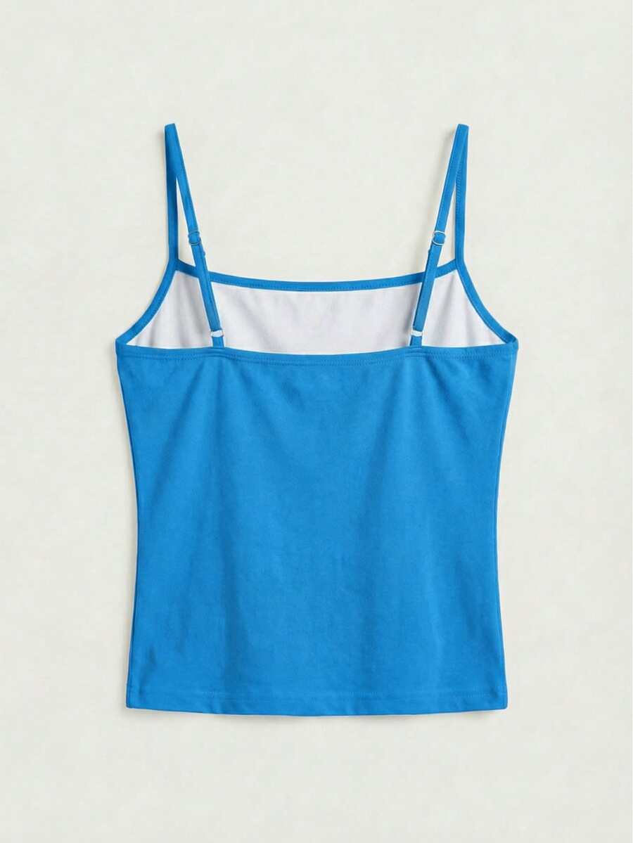 Women's blue floral print spaghetti strap camisole top in a slim fit short length design