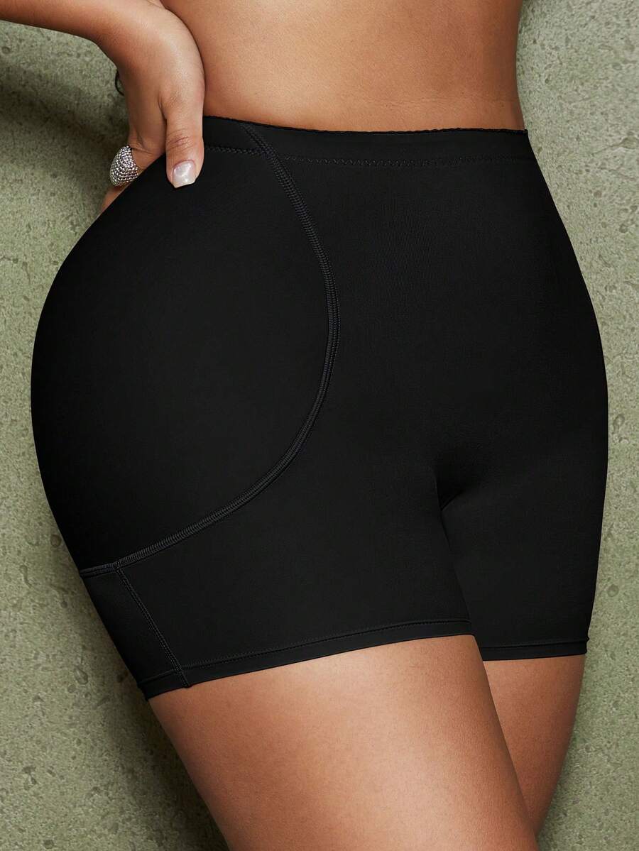 Women's waist cincher shapewear bottom featuring tummy control and padded hips.