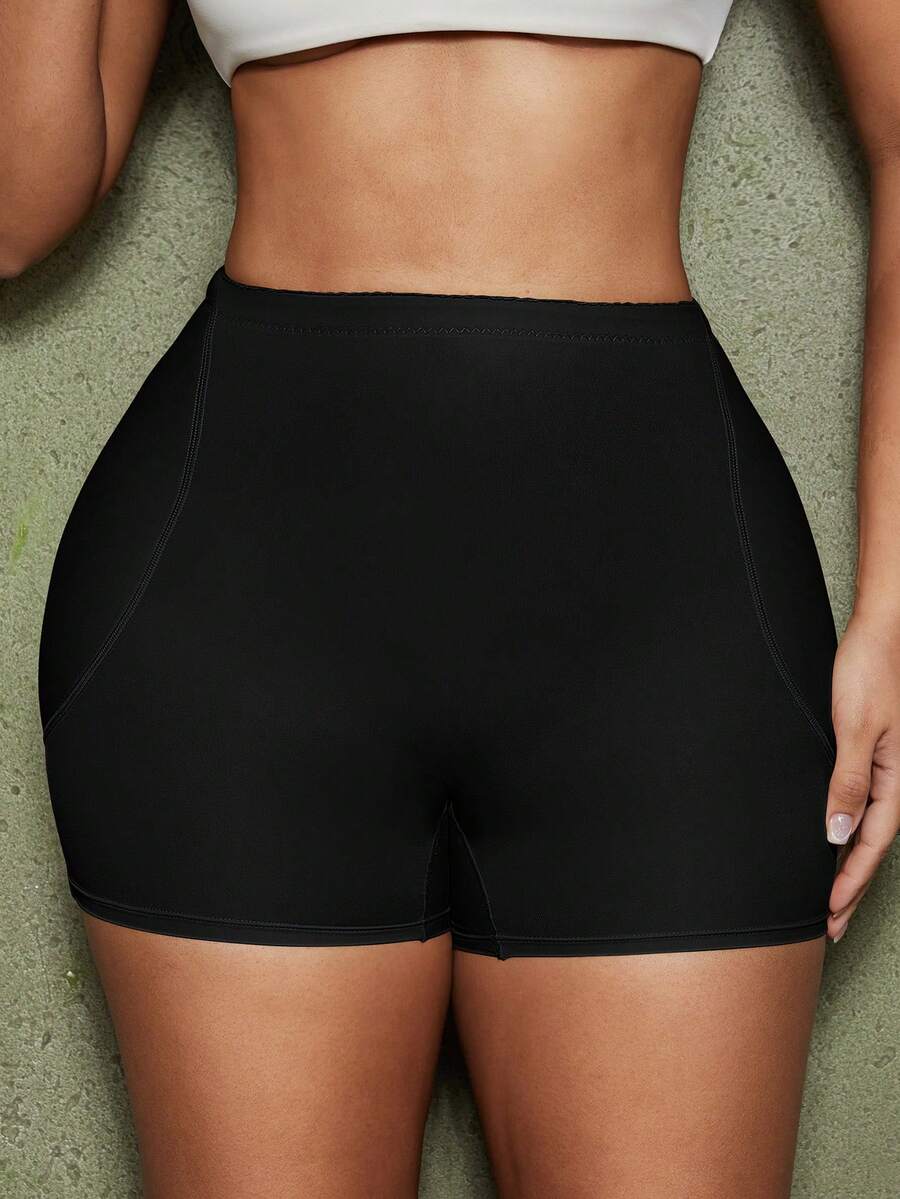 Women's waist cincher shapewear bottom featuring tummy control and padded hips.