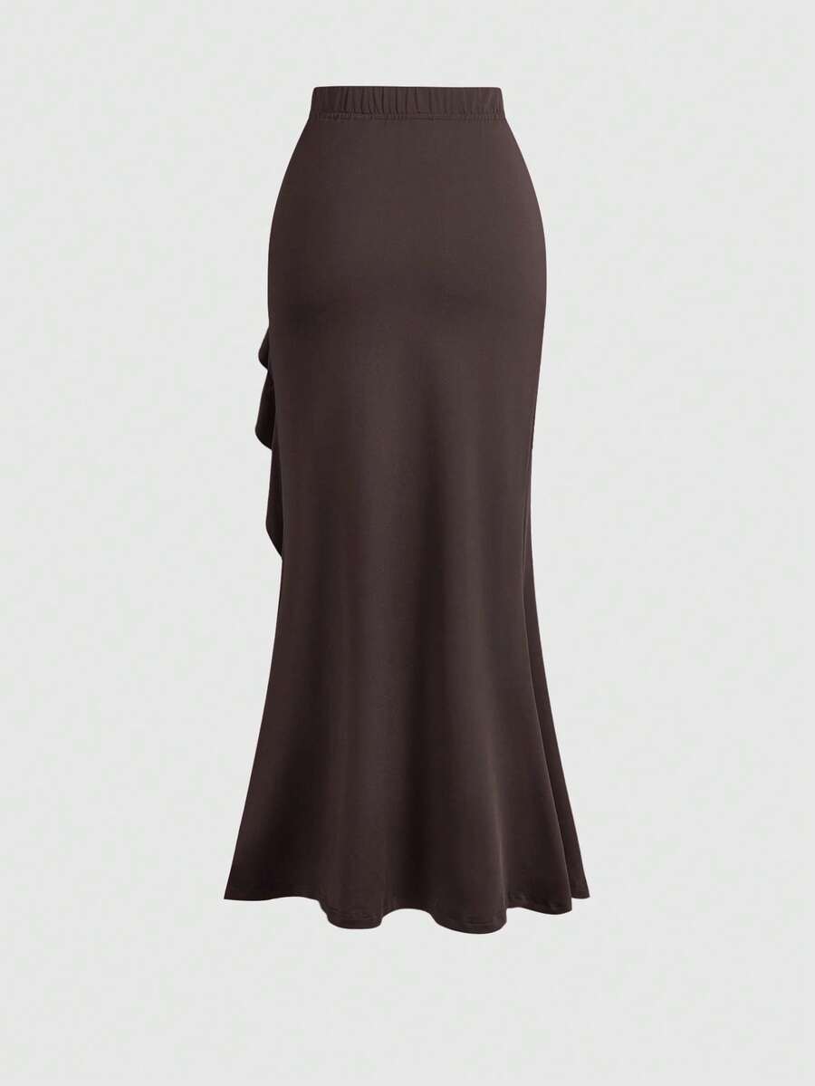 Women's ruffled slit hem skirt in black with criss-cross details, split thigh, skinny mermaid fit, and mid-waist style.