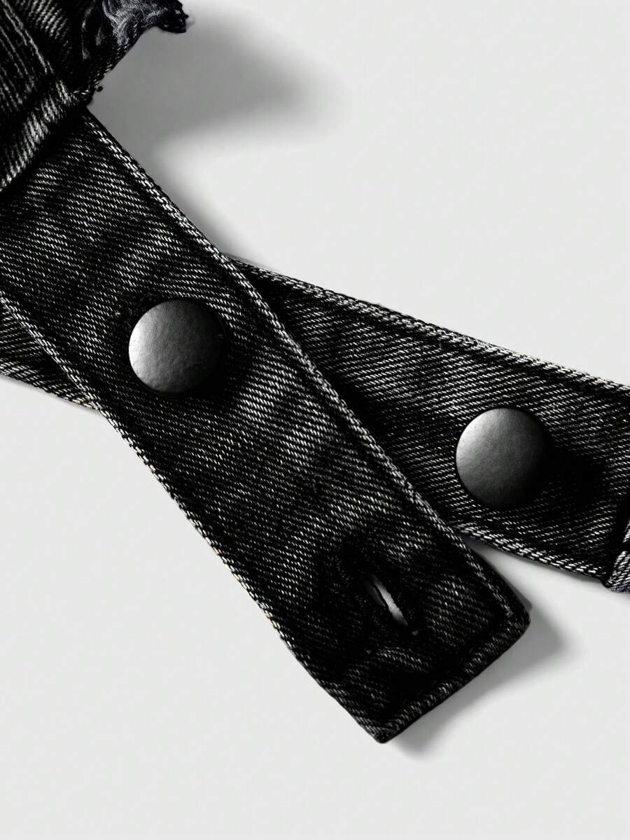 Women's denim halter crop top featuring a backless design, asymmetrical hem, single-breasted front, and lettuce trim.