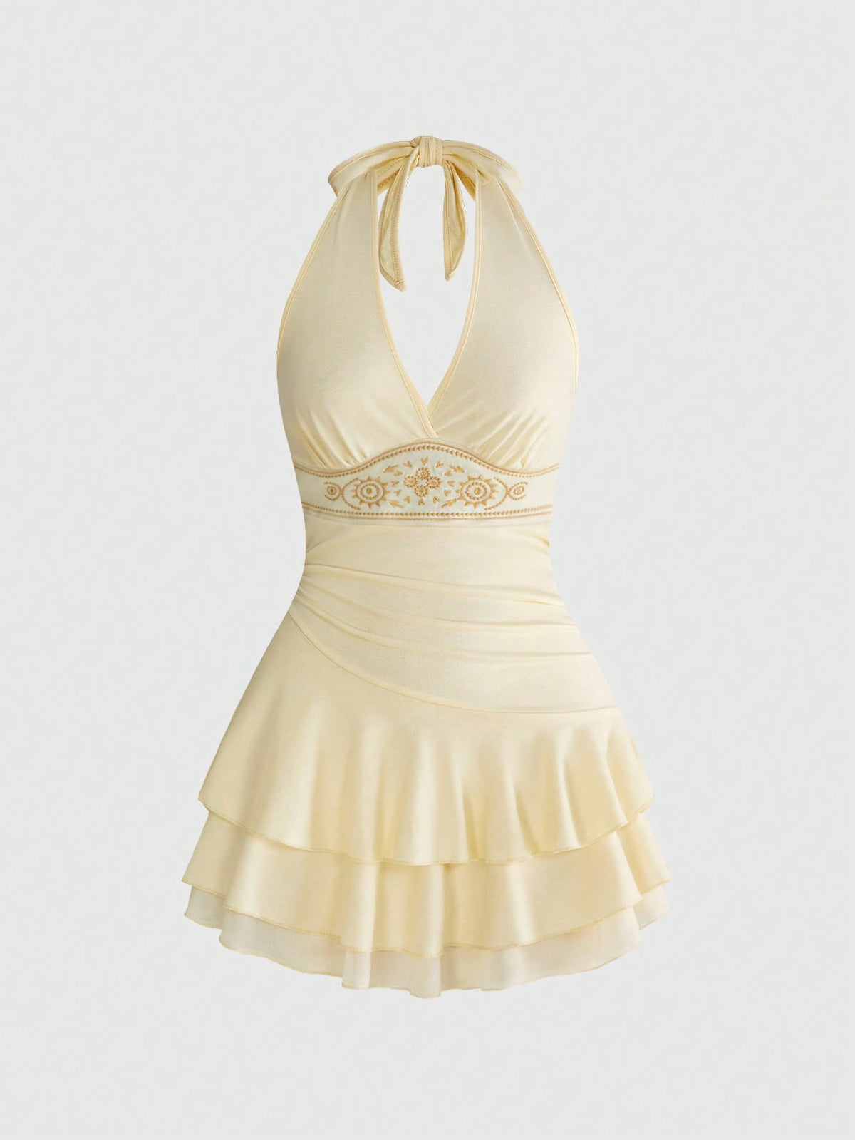 Women's sun totem embroidered sleeveless layered mini dress featuring a halter neck, backless tie back design, and slim fit high-waist A-line silhouette.