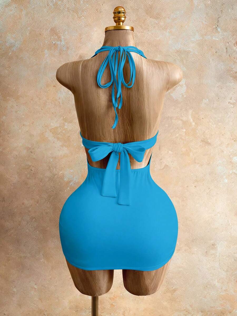 Sleeveless women's halter backless bodycon mini dress featuring lace-up knot back details and a high-waist pencil hem.
