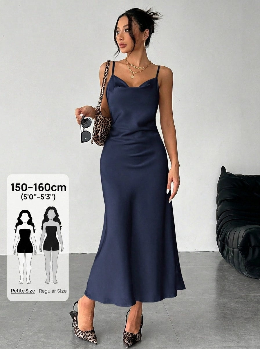 Women's long apricot satin cami dress featuring a draped swing collar, spaghetti straps, backless zipper back, and mermaid hem.