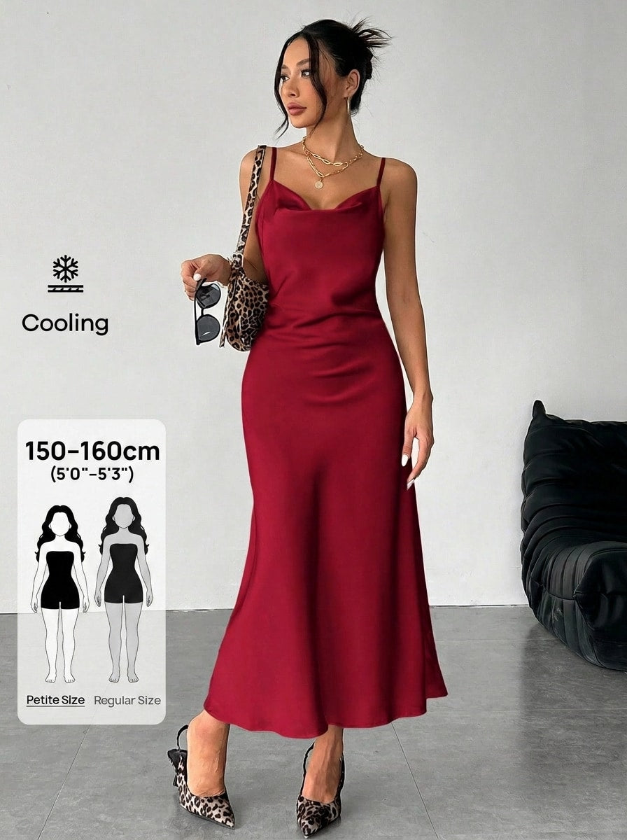 Women's long apricot satin cami dress featuring a draped swing collar, spaghetti straps, backless zipper back, and mermaid hem.