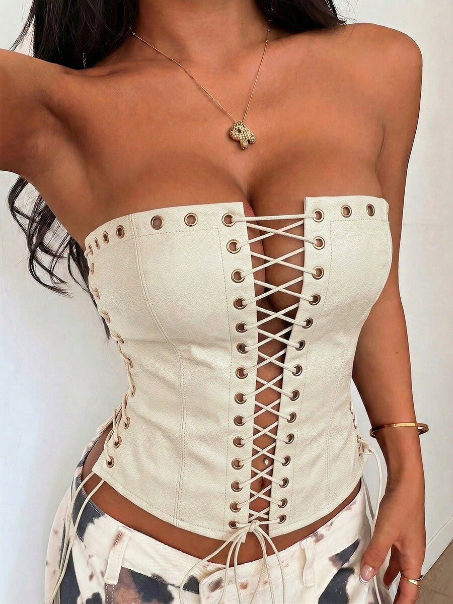 Women’s coffee brown faux leather lace-up crop top with strapless neckline, slit hem, and slim fitted silhouette for festival and nightlife wear.
