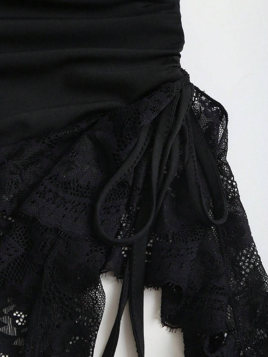 Women's coffee cowl neck cami dress with contrast lace patchwork, spaghetti straps, and an asymmetrical hem.