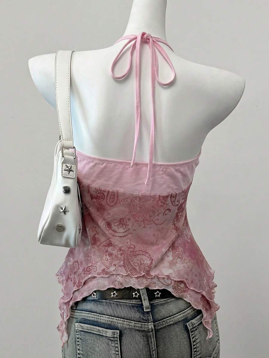 Women's backless halter cami top featuring a paisley print, sleeveless design, and an asymmetrical hem in knitted fabric.