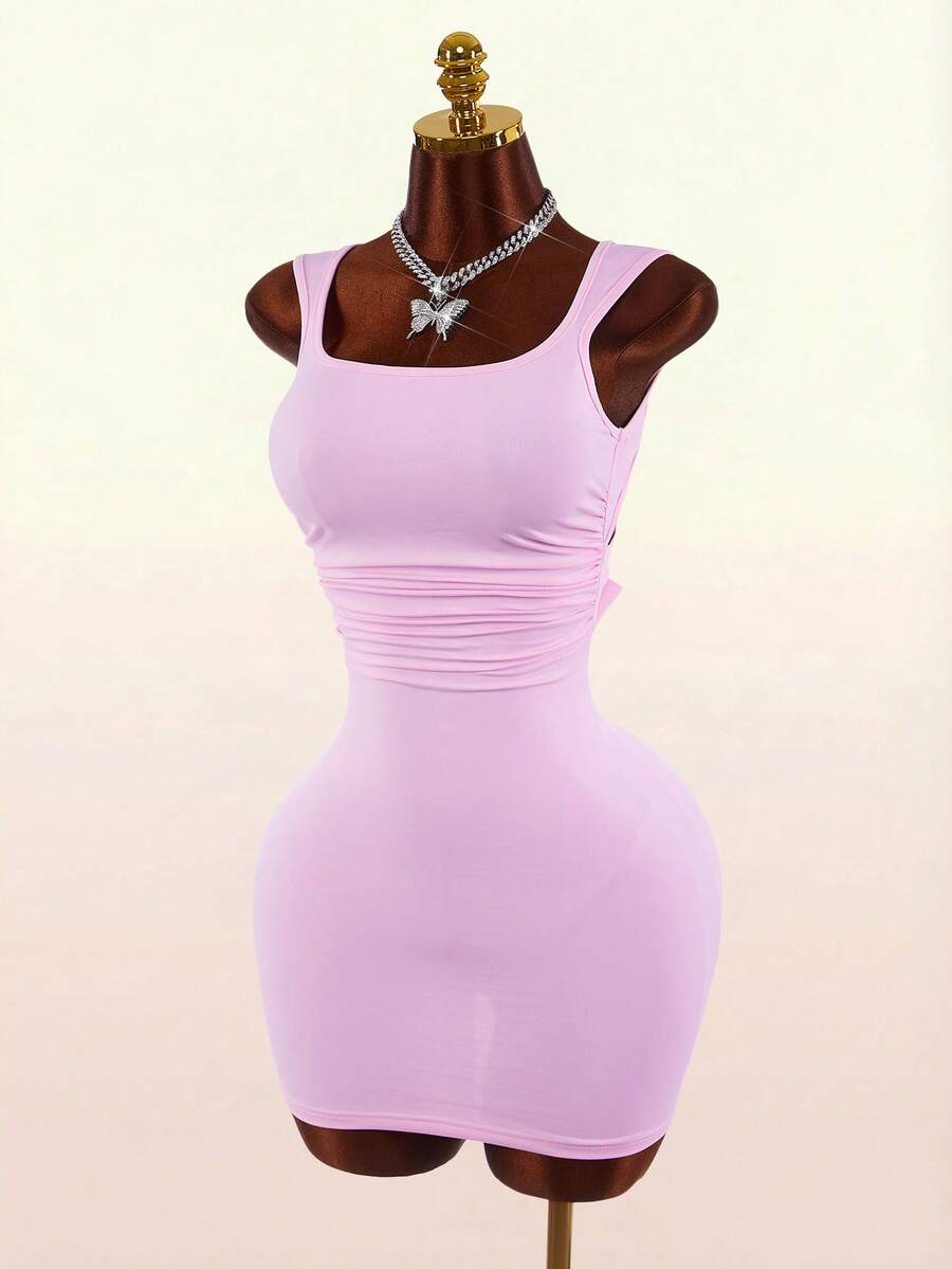Women's pink square neck sleeveless mini dress with slim fit knitted fabric and bow detail