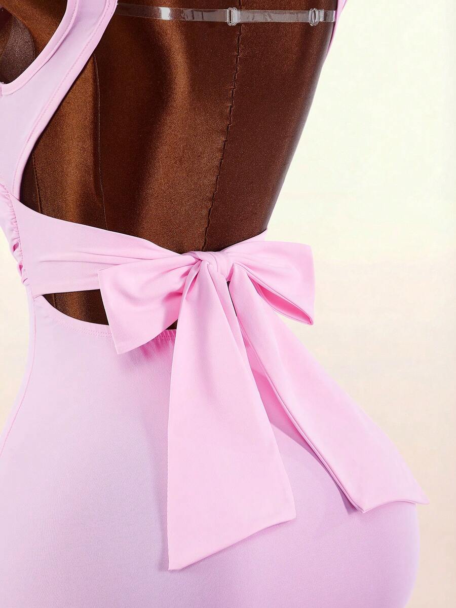 Women's pink square neck sleeveless mini dress with slim fit knitted fabric and bow detail