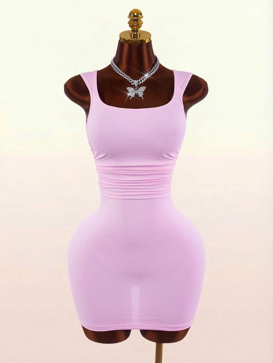Women's pink square neck sleeveless mini dress with slim fit knitted fabric and bow detail