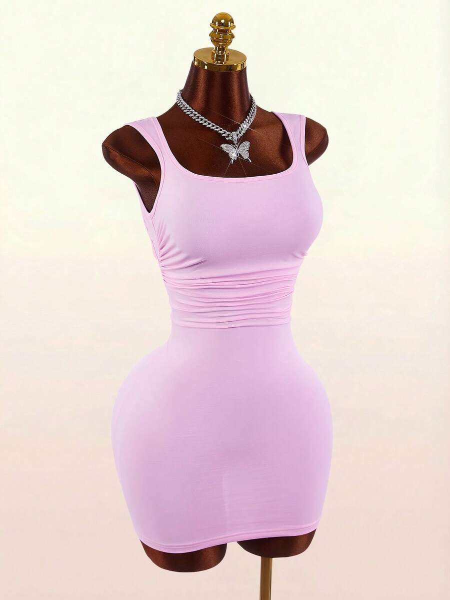 Women's pink square neck sleeveless mini dress with slim fit knitted fabric and bow detail