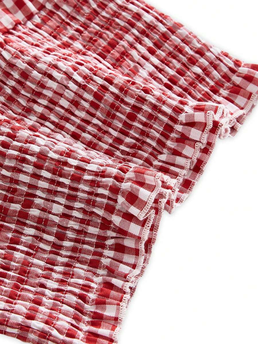 Black plaid halter crop tank top for women featuring a bow detail and slim fit design.