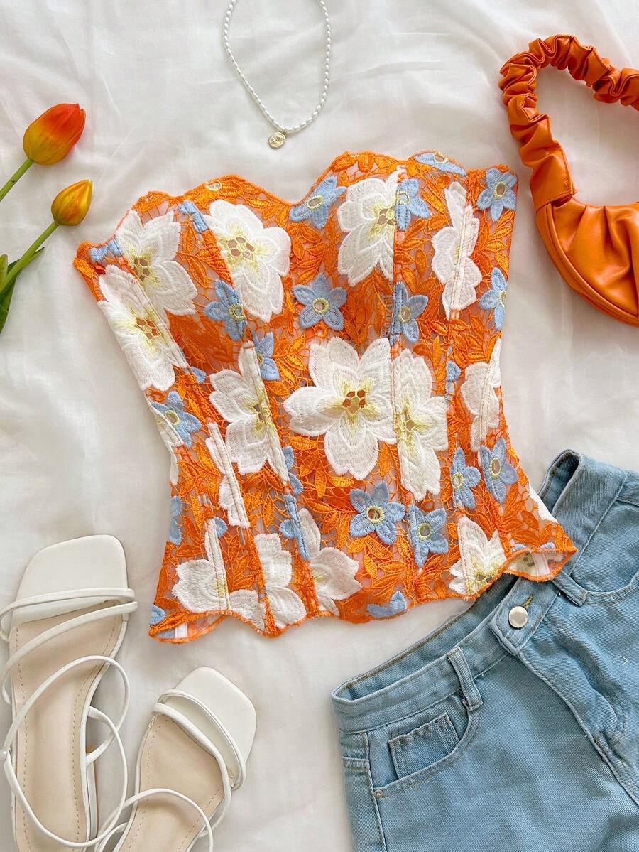 Strapless floral lace corset top with lace-up detail, asymmetrical hem, and slim fit for women.
