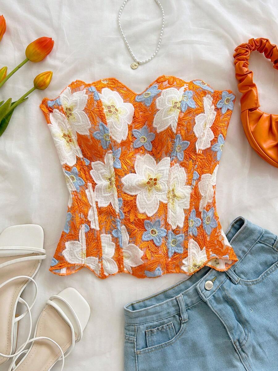 Strapless floral lace corset top with lace-up detail, asymmetrical hem, and slim fit for women.