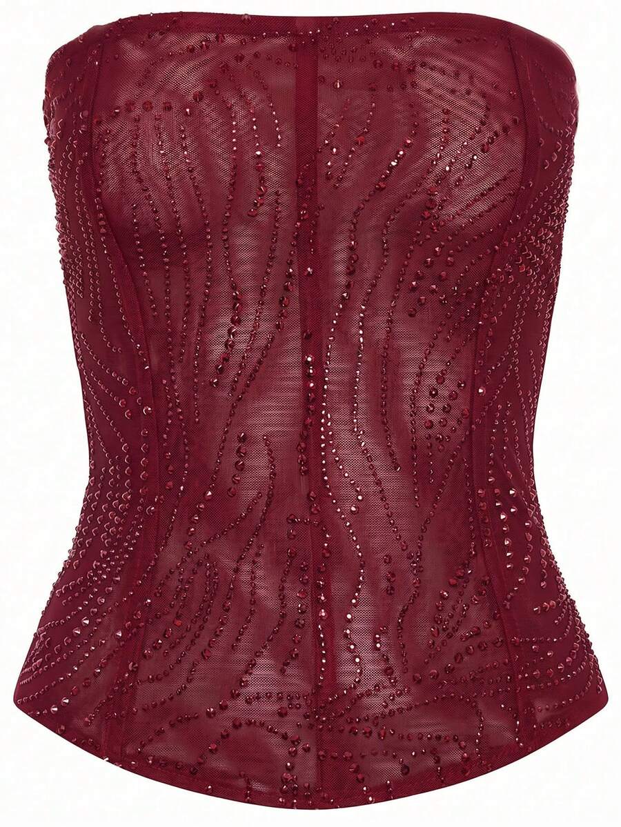 Black strapless corset tube top with sparkling rhinestone decor, boned silhouette, and lace-up tie back.