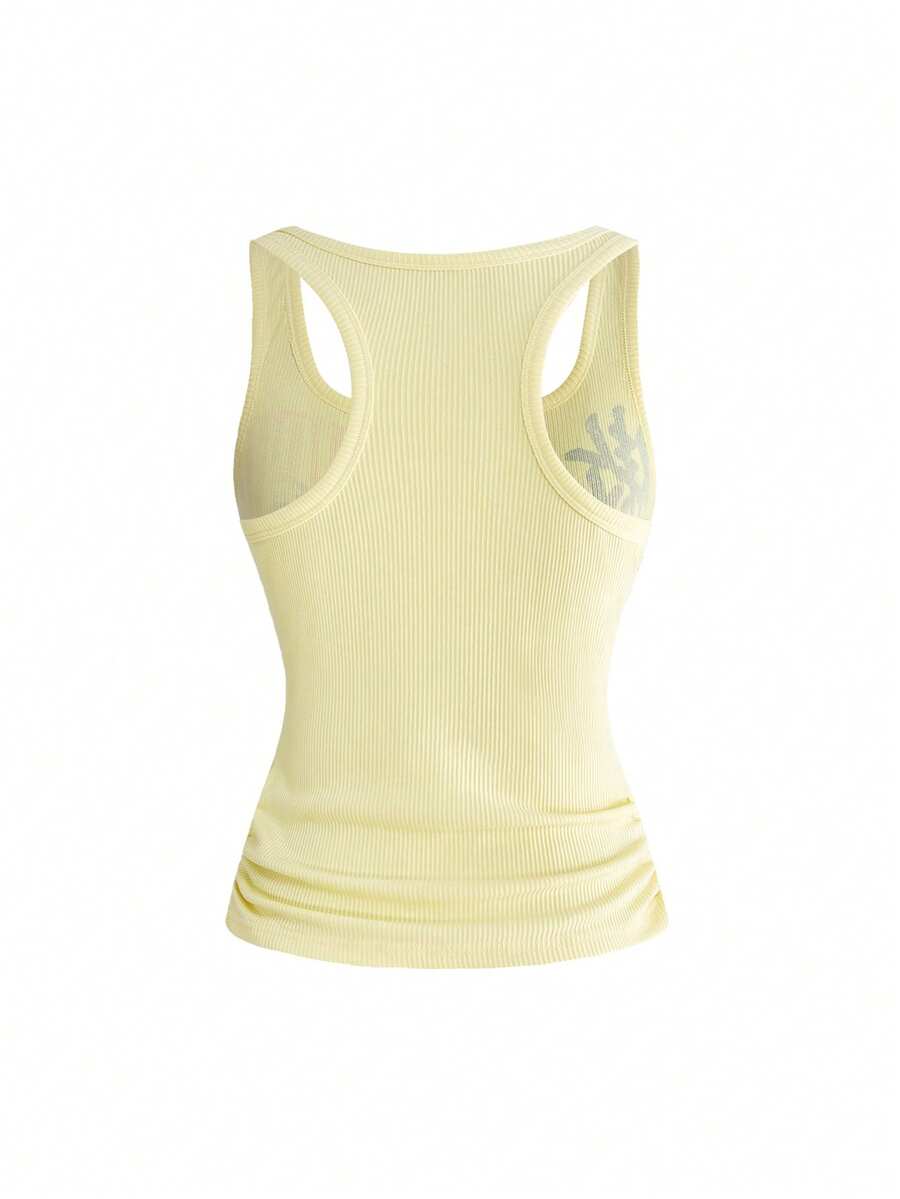 Black rib-knit scoop neck tank top featuring leopard print and graphic lettering for women.