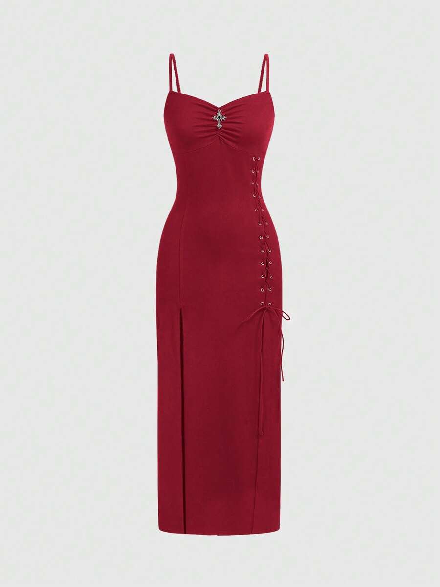 Black gothic bodycon slip dress featuring spaghetti straps, lace-up grommet eyelet accents, and a high split thigh hem.