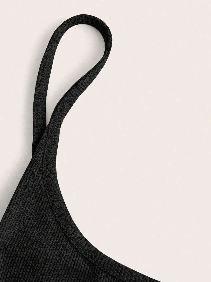 Women's black cropped camisole top with faux crocodile texture, backless spaghetti straps, and matching arm sleeves.