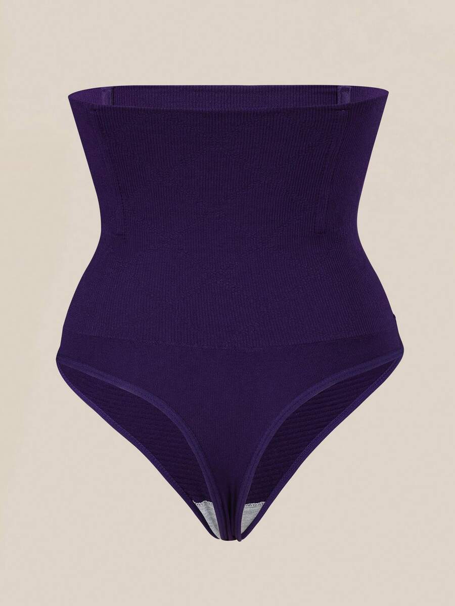 Black high waist seamless tummy control panties for women featuring high-stretch knitted fabric and contrast mesh details.