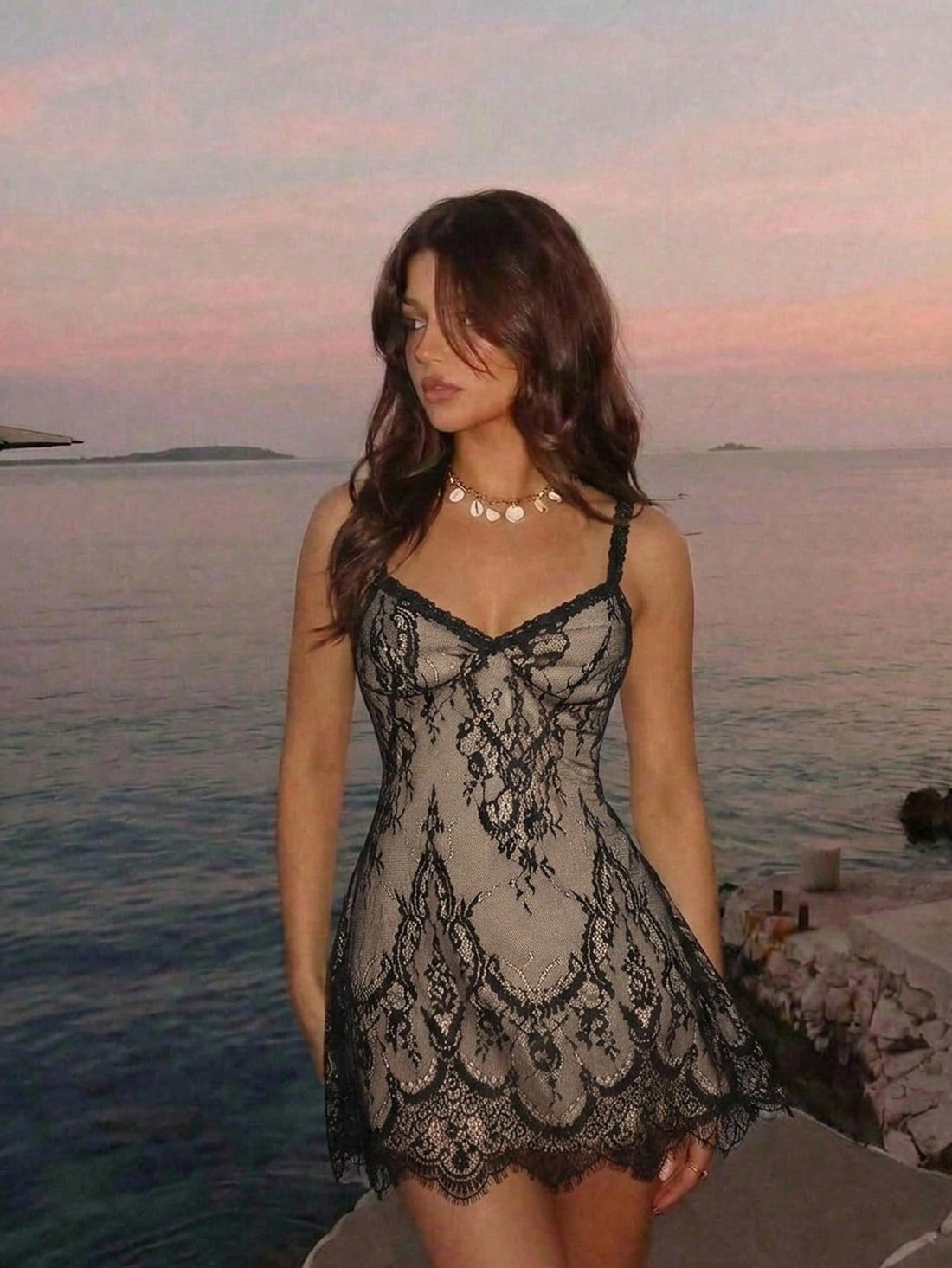 Skyraze women's lace waist-cinching cami dress featuring spaghetti straps, a high waist, and slim fit design.