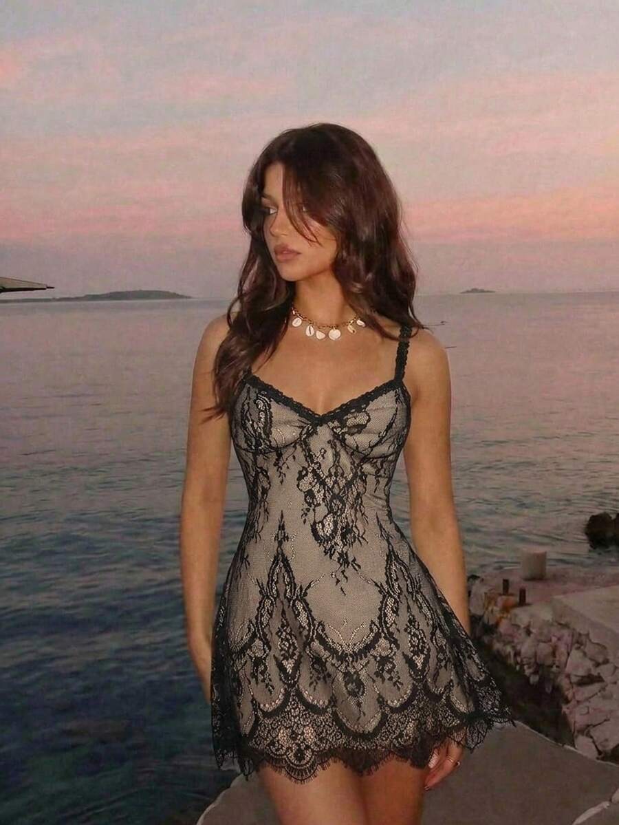 Skyraze women's lace waist-cinching cami dress featuring spaghetti straps, a high waist, and slim fit design.