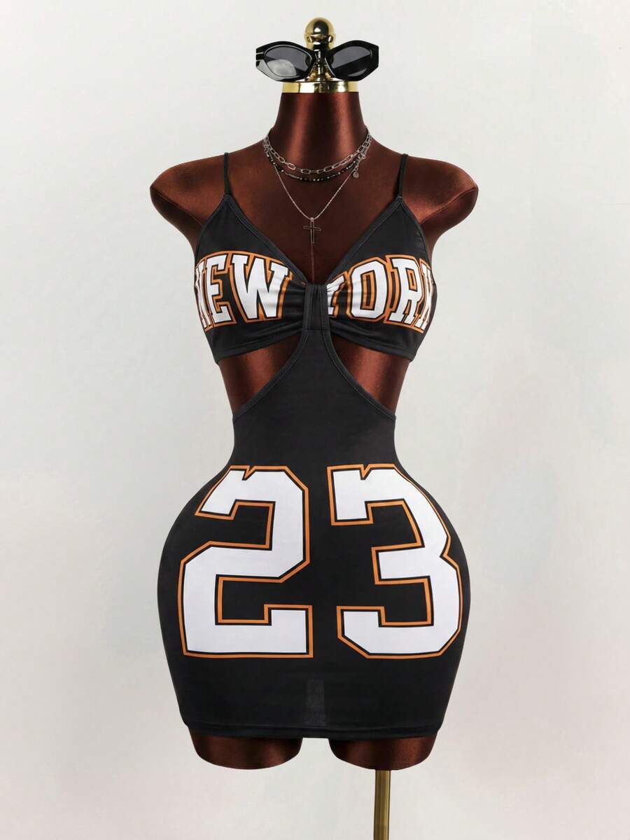 Women's black letter print cami mini dress with spaghetti straps and a slim fit pencil silhouette.