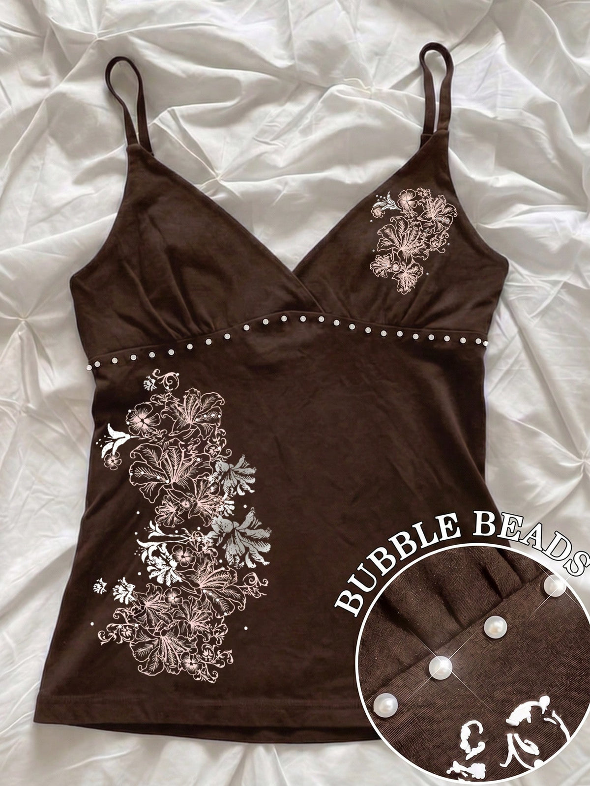 Women's slim fit spaghetti strap cami top featuring a tropical hibiscus floral graphic print.