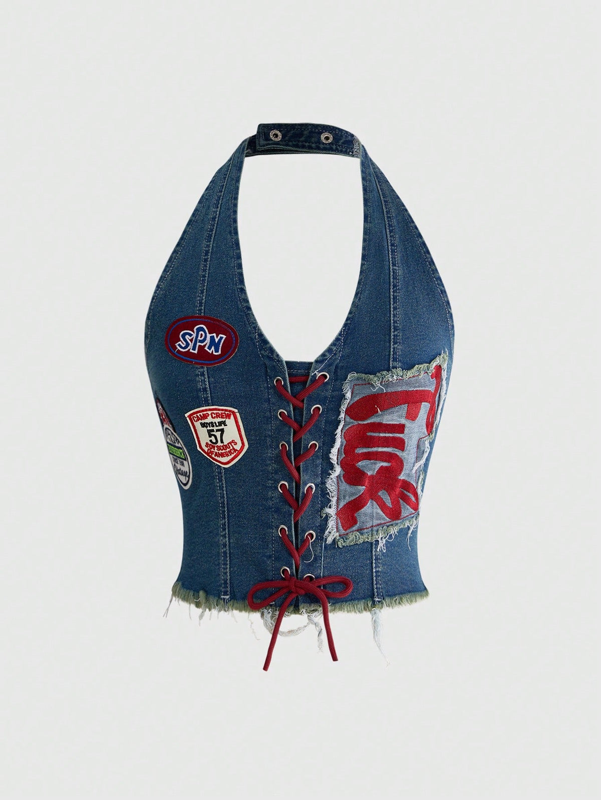 A black Y2K denim halter crop top featuring a backless lace-up grommet eyelet design with a slim fit micro crop length.