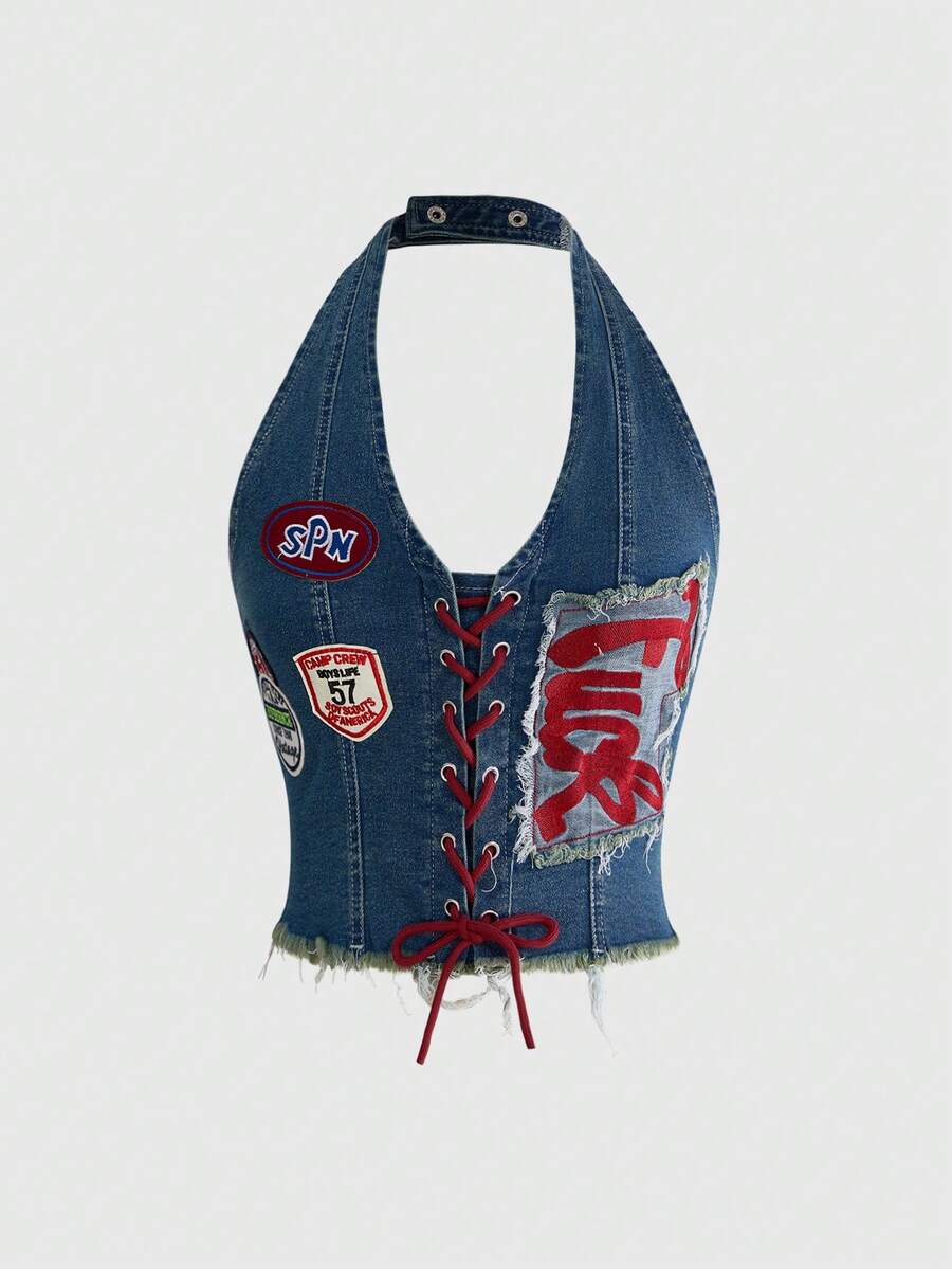 A black Y2K denim halter crop top featuring a backless lace-up grommet eyelet design with a slim fit micro crop length.