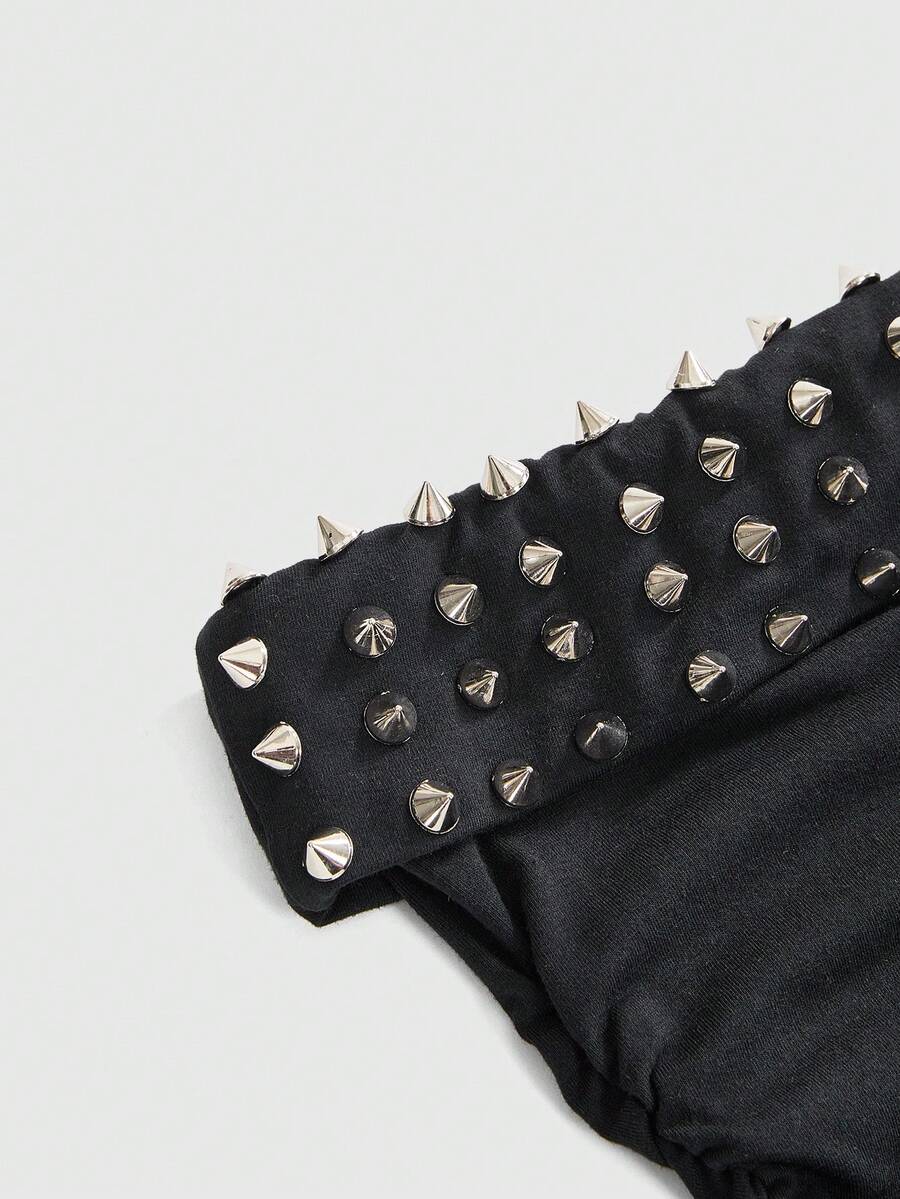 Women's sleeveless halter cropped camisole top in black with graphic slogan print and studded detailing.