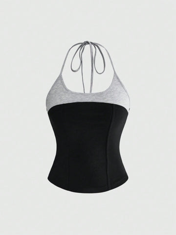 Women's black halter slim fit camisole top featuring a colorblock 2-in-1 design in soft knitted fabric.