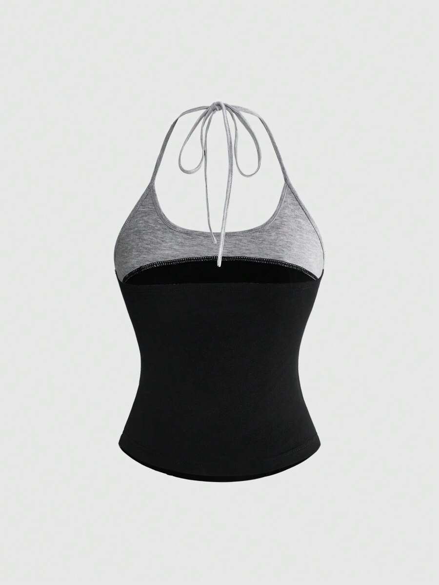 Women's black halter slim fit camisole top featuring a colorblock 2-in-1 design in soft knitted fabric.