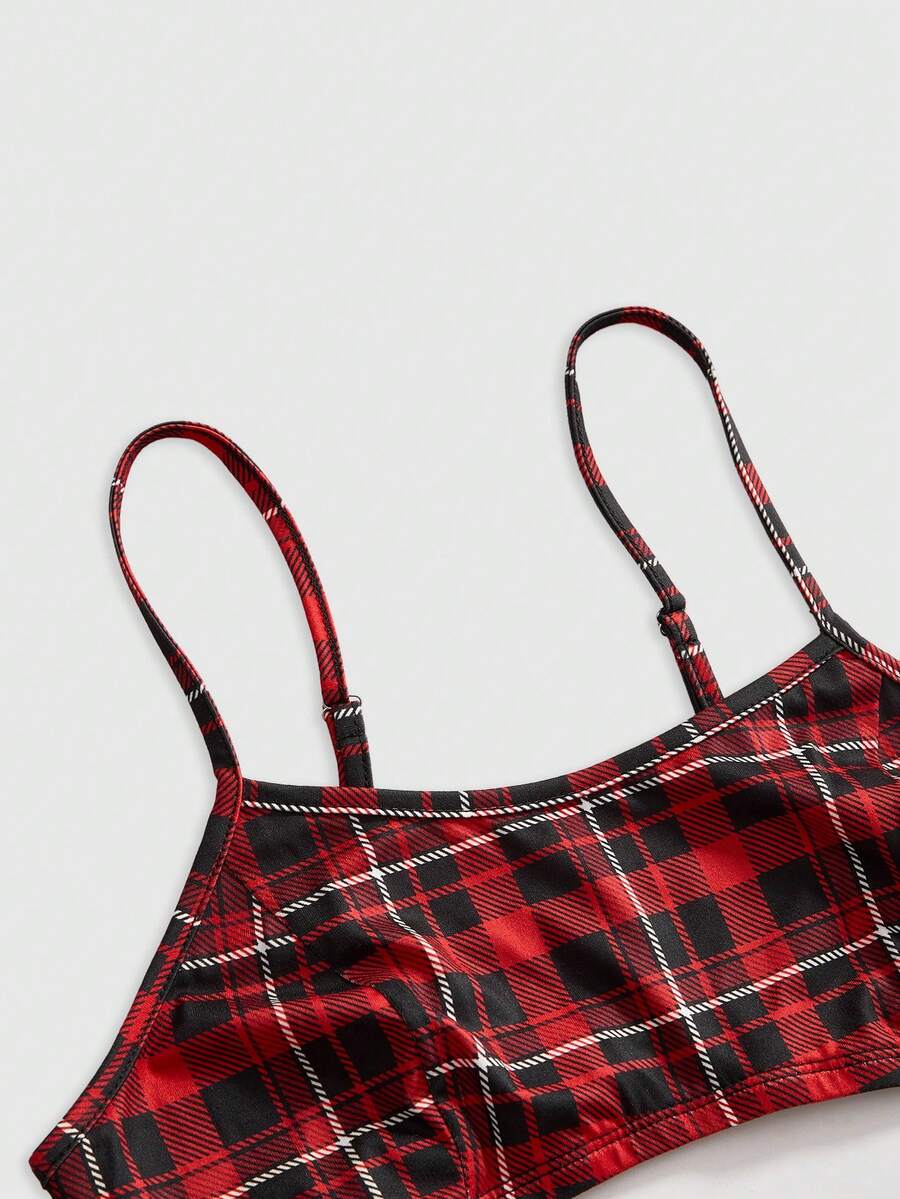 Black plaid 2-in-1 crop top featuring spaghetti straps, an asymmetric hem, and sheer mesh long arm sleeves for women.