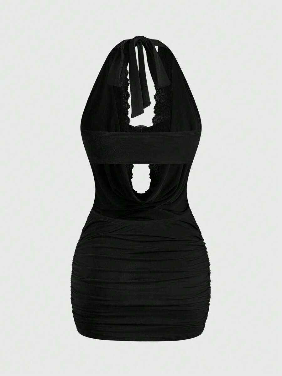 Black Y2K women's backless halter bodycon mini dress set featuring draped details, short sleeves, mid-waist pencil hem, and included undershirt.