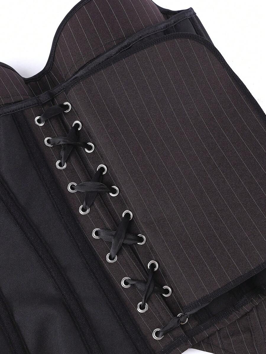 Black overbust corset top with strapless design, boned support, tie-back and zipper closure for women shapewear styling.